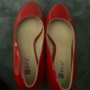 Red high heel shoes.. 2 1/2 inches.